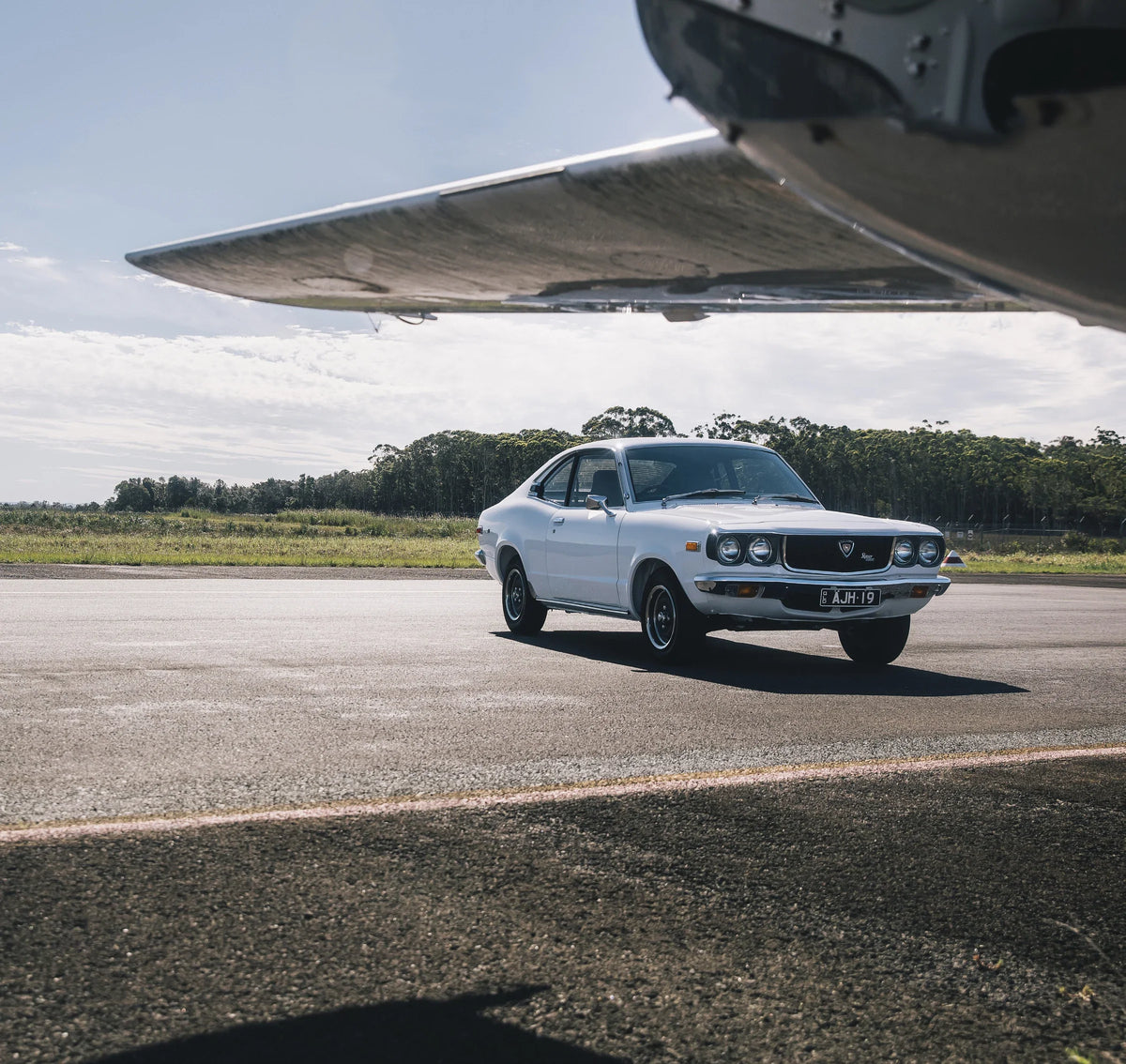 Adam’s white 1974 Mazda RX-3 Series 2 coupe